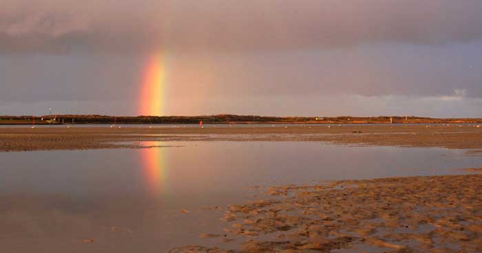 regenboog Mokbaai Texel laag water
