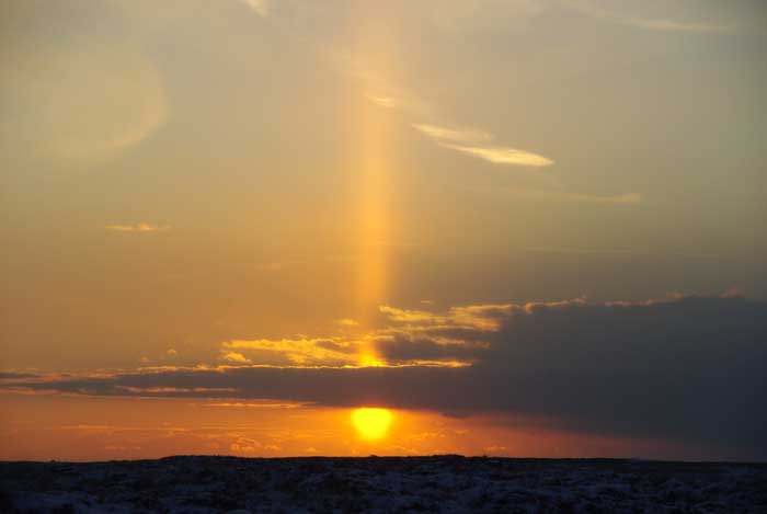 zonnezuil zonsondergang Texel