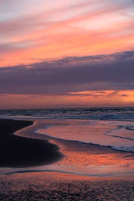 zonsondergang zee strand